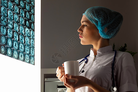 外科医生女医生检查X光断层职业放射科临床疾病实验室x射线女性癌症外科背景