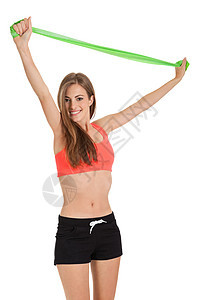 运动的年轻女运动员 用物理胶带乳胶胶带锻炼理疗二头肌理疗师女士女性卫生力量橡皮骨科保健图片