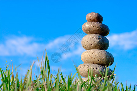 石头蓝色想像力成就卵石建筑组织天空建造平衡沉思图片