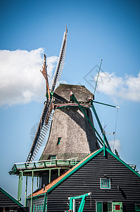 荷兰风车翅膀蓝色能源建筑木头瓷砖天空图片