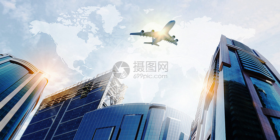 天空中的平地客机高楼旅行飞机办公室街道金融建筑中心城市图片