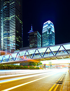 夜间现代城市隧道驾驶运动商业场景运输旅行景观线条市中心图片