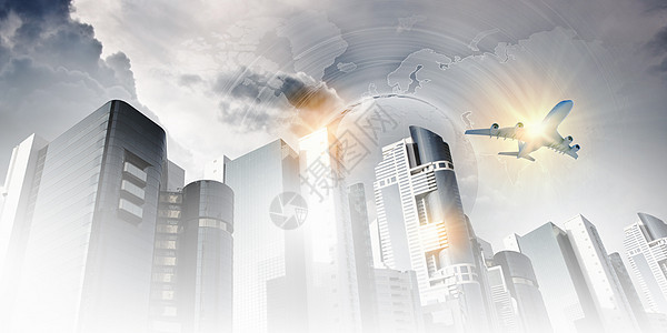 天空中的平地地标公司飞机摩天大楼蓝色建筑学喷射建筑金融办公室图片