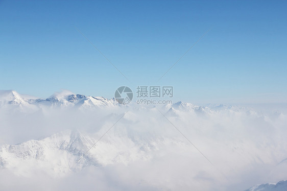 山峰峰天空滑雪假期旅游高山首脑季节环境全景日出图片