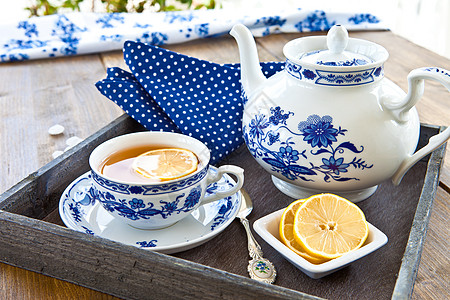 热茶加一片柠檬冰糖托盘勺子饮料杯子酿造茶壶绿茶红茶盘子图片