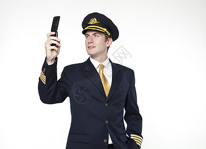 年轻男子以客机驾驶员的形式出现驾驶航班飞机照片航空微笑天线衬垫喷射航空公司图片