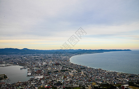 日本Hakodate的美丽场景1日落紫色海洋景观电缆游客城市天空旅行港口图片