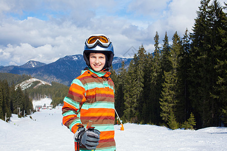 滑雪女孩季节娱乐自由晴天运动员背光衣服风镜头盔运动图片