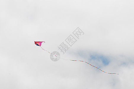 一个Kite飞过云天运动阳光空气太阳爱好娱乐晴天细绳乐趣飞行图片