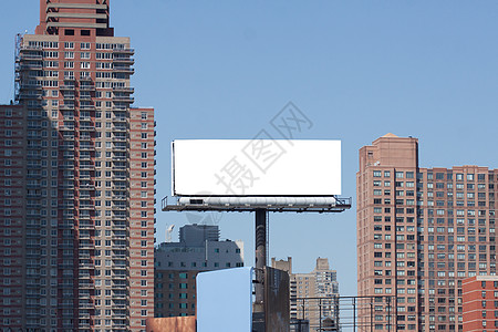 大都市的广告牌 两栋红砖高楼图片