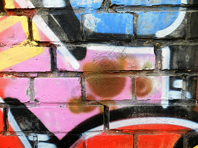 街头艺术旧墙上涂着色彩多彩的涂鸦城市艺术创造力背景