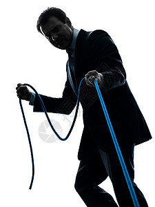 生意人拉绳子的背影绳索商业冒充管理人员人士力量概念成年人阴影男人图片