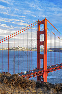 著名的金门大桥垂直视图天空金属吸引力纪念碑阳光堡垒历史性旅行建筑学电缆图片