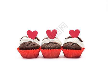 三个巧克力情人节纸杯蛋糕背景图片