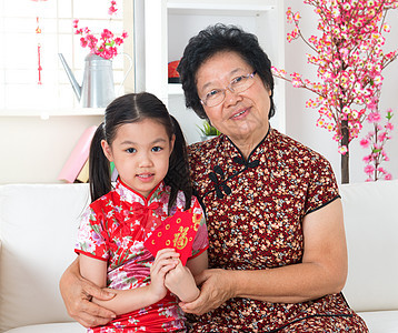 庆祝中国新年传统女孩祝福文化家庭女性女士青年孙子运气图片