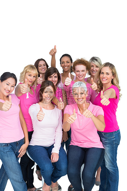 穿着粉红色乳癌的自愿快乐妇女图片