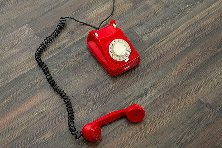 红电话木地板房间技术器具地面红色热线拨号说谎电子产品图片