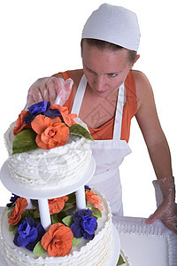 婚礼蛋糕制作人艺术家专注焦点手帕选择性成人糕点奶油食物美味图片