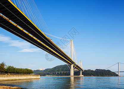 香港的丁九和清马桥吊桥地标海岸通道蓝天爬坡运输天空海洋街道天际图片