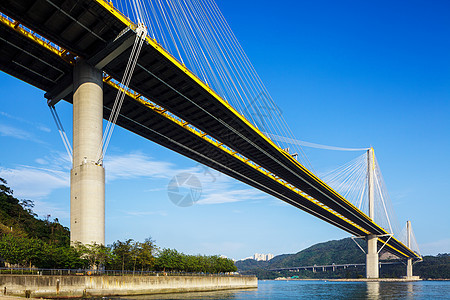 香港的廷九桥吊桥天际海洋街道海岸蓝色天空运输爬坡地标蓝天图片