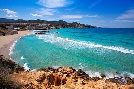 巴利阿里群岛Ibiza海滩的Cala Tarida石头波浪天堂假期海岸晴天天空太阳小岛旅行图片
