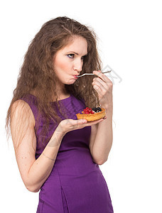 女人享受蛋糕早餐黑发女性食物水果营养浆果糕点垃圾商业图片
