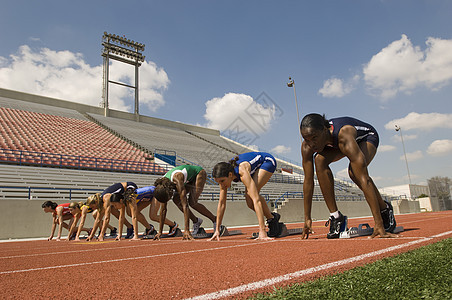 初等街区女田径运动员小组成员女性中年竞赛肌肉运动起跑赛跑者轨道竞技体育场图片