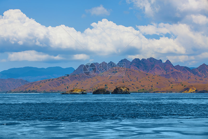 科莫多岛旅行海景公园热带海岸线天空太阳海岸海洋假期图片