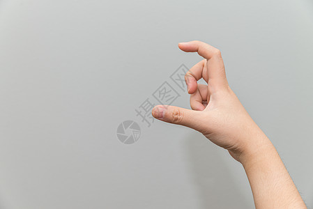 手持假冒卡片手势拇指商业一部分灰色信号帮助广告手腕身体图片
