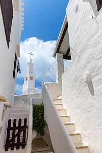 白人村庄Sant Lluis的比尼贝奎尔村假期别墅村庄旅游晴天天空蓝色旅行粉饰住宅图片