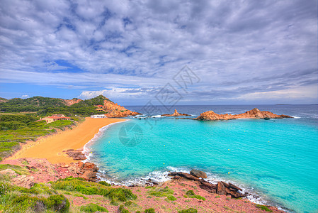 巴利阿里群岛Menorca的旅行太阳海景海岸地标海洋蓝色假期天空海岸线图片