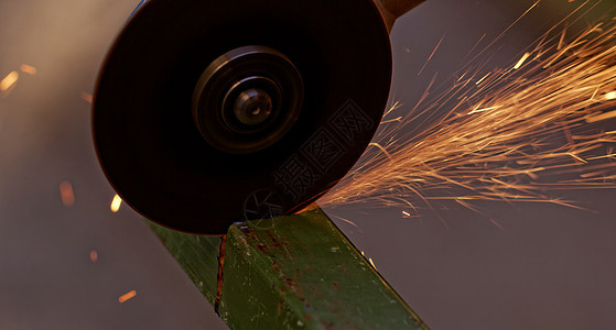 手研磨机看到钢铁工厂闪光刀刃磁盘金属机械钻石车轮圆圈生产图片