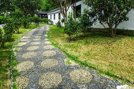 中国花园的泥石小路石径花园卵石石头草地园林岩石建筑庭院走道图片