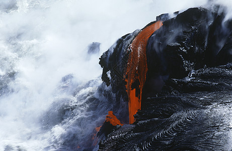美国 夏威夷大岛火山 国家公园冷却熔岩和冲浪图片