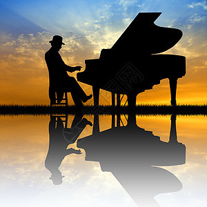 钢琴家庆典音乐会钢琴男人乐趣日落唱歌音乐图片