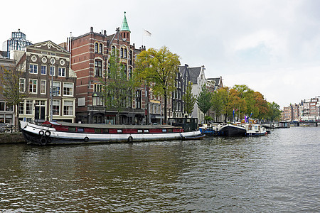 来自荷兰阿姆斯特尔阿姆斯特丹的城市景观首都中心运输建筑物观光旅游船屋图片