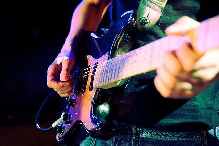 吉他玩家娱乐流行音乐乐器细绳生活音乐会工作室吉他手电气音乐背景图片
