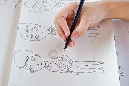 草图和绘画手牵手拇指工作手指艺术品白色铅笔设计师桌子学习笔记图片