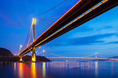 夜里香港的廷九桥悬吊桥海洋运输地标建筑学建筑通道天际图片
