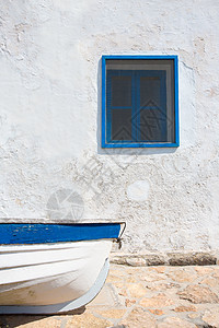 地中海船只和白色和蓝色的洗白玻璃墙旅游街道地标天堂旅行假期血管太阳村庄房子图片
