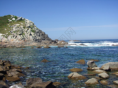 礁群岛蓝色海岸海滩植被石头悬崖天空海洋活力群岛图片
