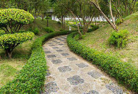 中国花园的泥石小路花园卵石岩石建筑院子公园石头庭院人行道草地图片