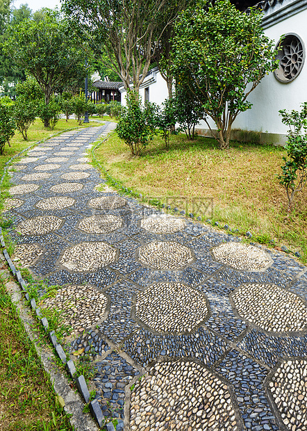 中国花园的泥石小路卵石花园石头院子人行道建筑草地岩石庭院公园图片