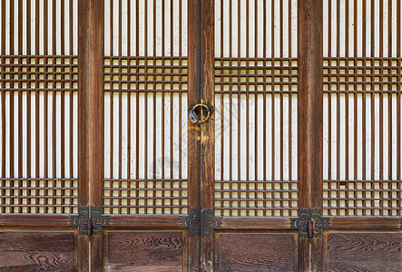 传统木制门门把手戒指金属建筑学棕色木头入口古董圆圈宗教图片