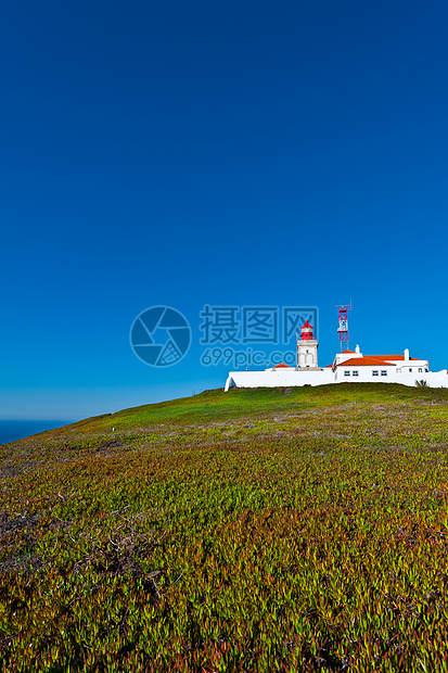 灯塔支撑地标植物海滩蓝色山坡气候导航安全海洋图片