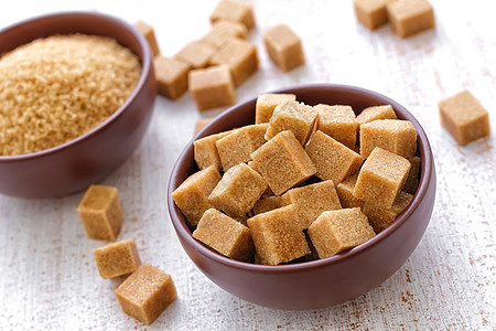 红糖糖糖桌子糖罐粮食饮食制品木头精制用具陶器蔗糖背景