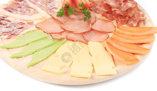 木盘上的各种奶酪食物美食盘子模具小吃大理石木头蓝色早餐白色图片
