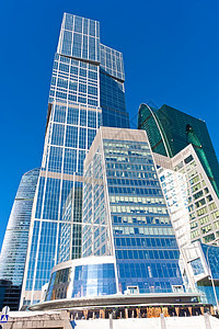 现代系统扩张者窗户建筑反射商业房子摩天大楼蓝色建筑学太阳市中心图片