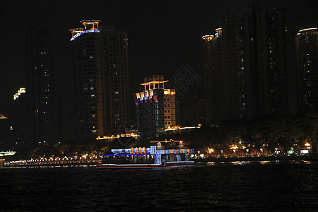 夜里在珍珠河上行驶的船运动流动珍珠建筑师建筑学海浪交通运输市中心场景巡航图片