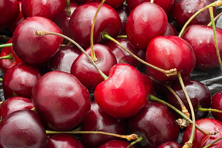 红樱桃宏观叶子水果甜点红色食物浆果背景图片